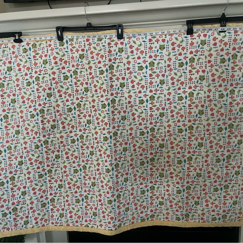 Charming Multicolor Quilt with Whimsical Patterns